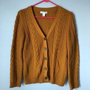 yellow button up sweater